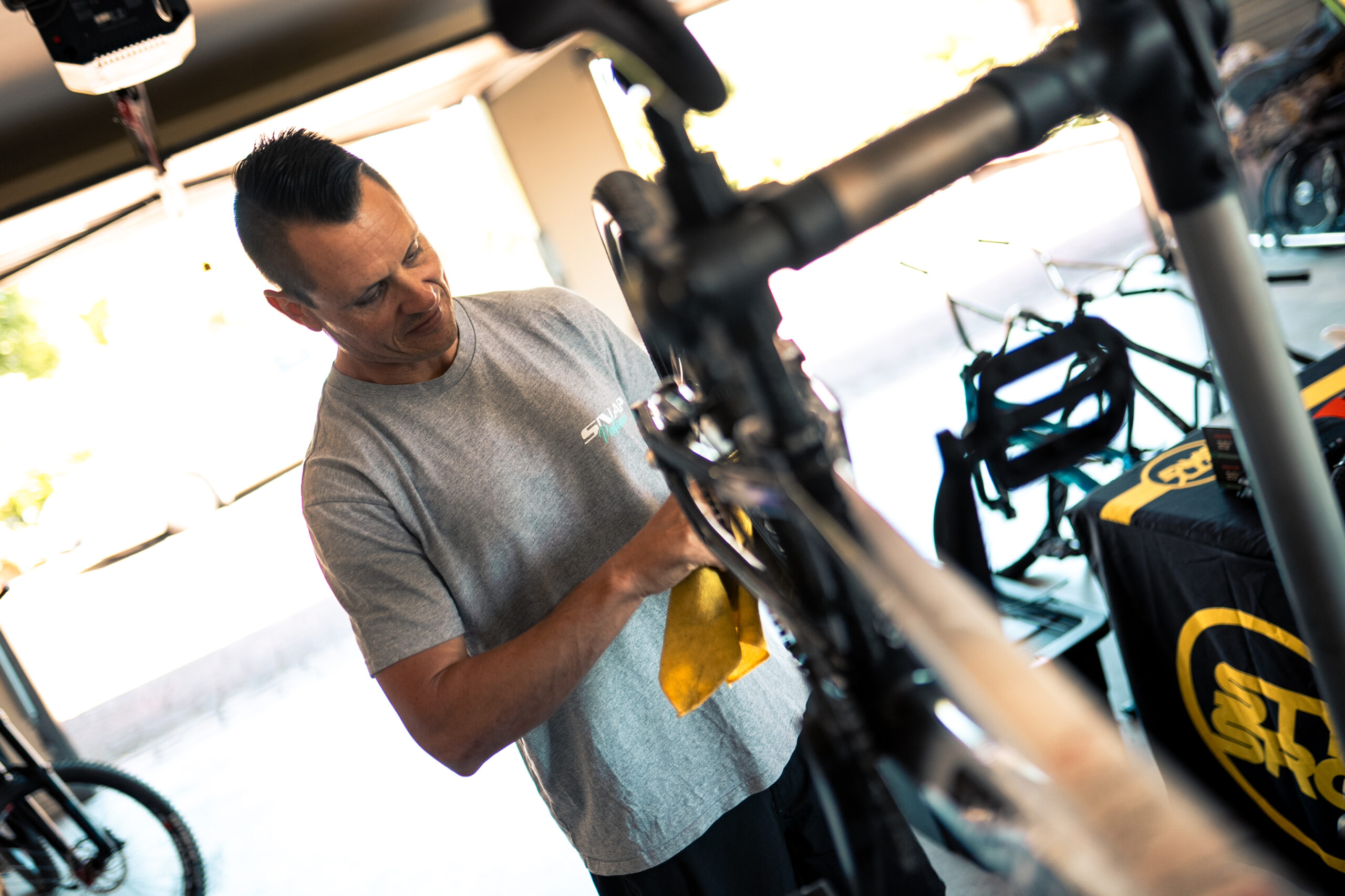 Snap Performance Director in Workshop working on BMX Bike
